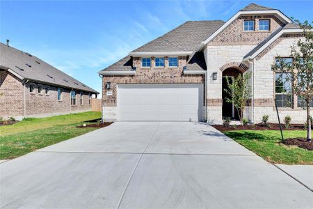 New construction Single-Family house 13613 William Tyler Way, Manor, TX 78653 Premier Series - Willow- photo 1 1