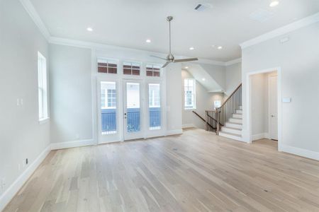 12’ ceilings with tons of light from the glass doors, transom windows on top and large windows everywhere.