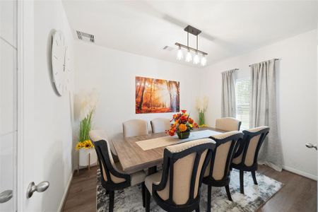 Home office currently being used as a dining room.  This room is spacious enough for seating of 8 at a dining table!!  French doors with more glass in-lay offers peace and quiet, while still allowing natural light and access to the rest of the home.