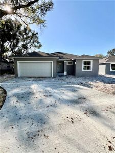 New construction Single-Family house 1303 26Th Street Nw, Winter Haven, FL 33881 - photo 0