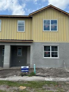 New construction Townhouse house 3891 Knotty Pine Street, Saint Cloud, FL 34772 - photo 0