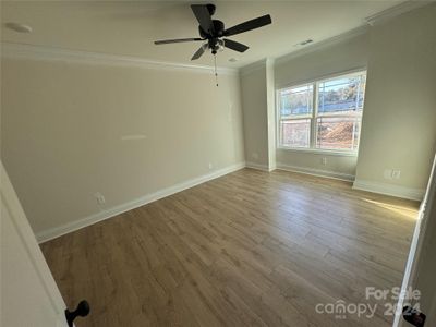 Primary bedroom with two walk in closets