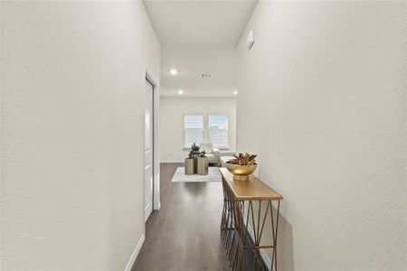 Hall featuring dark hardwood / wood-style flooring