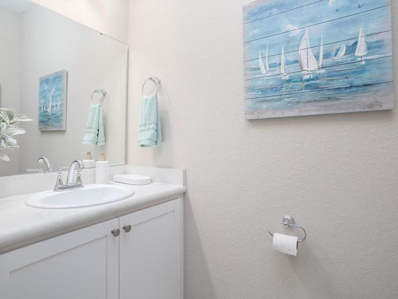 Along with a powder room for guests - Shelby model home in Lake Alfred, FL