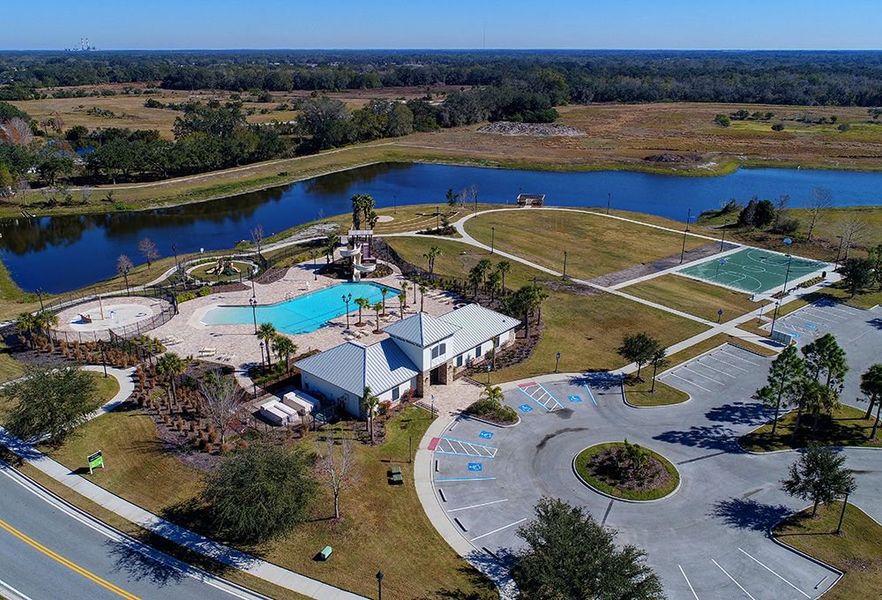Cross Creek walk to amenities in the neighborhood pool, basket ball courts, fire pit, green spaces, water slide, splash pad in Parrish, FL new home construction by William Ryan Homes Tampa