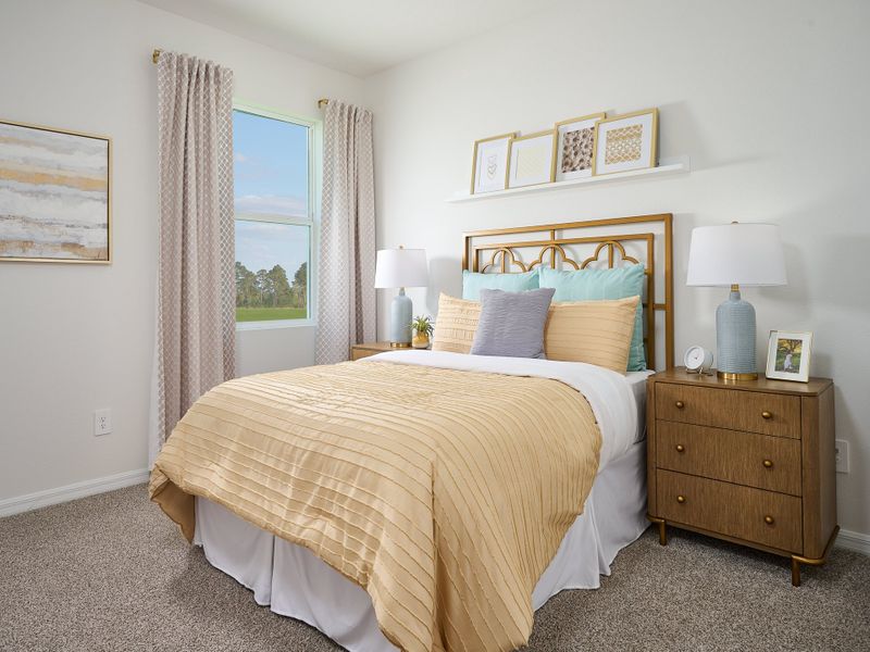 Secondary bedroom of the Foxglove plan at The Grove at Stuart Crossing.