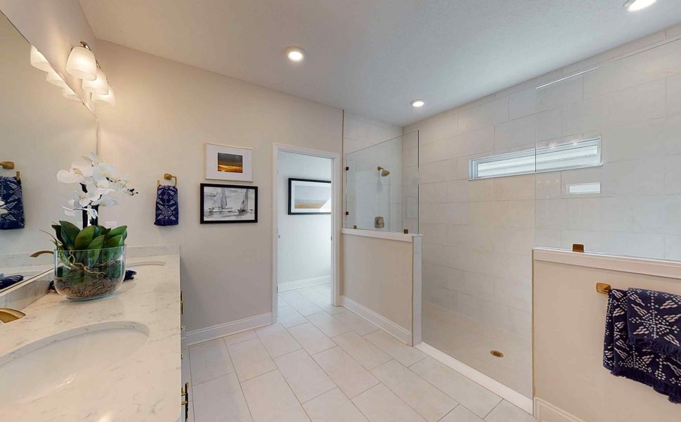 Silver Maple floor plan model home owner's suite bathroom by Century Communities