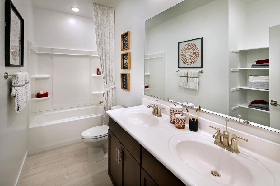 Your guest are sure to enjoy the double vanity sinks in this floor plan.