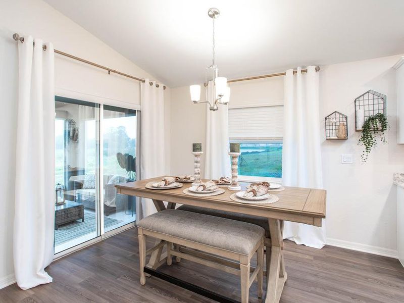 Meals are a delight in your sunny dining cafe  - Parker model home in Eagle Lake, FL