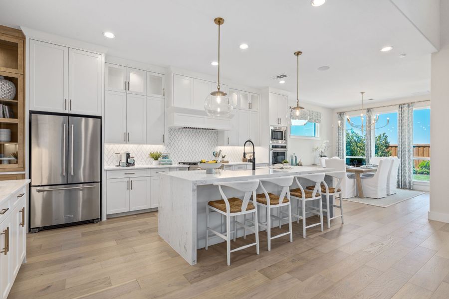 Plan 1640 Kitchen - Mosaic 60s Model - Photo by American Legend Homes