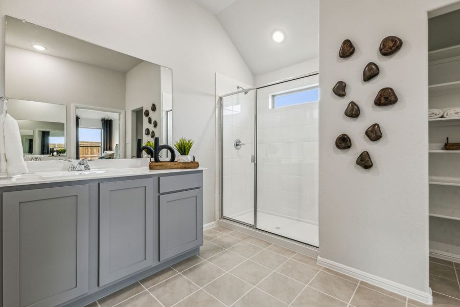 Primary Bathroom in a Stonehaven new Turquoise home in Seagoville TX by Trophy Signature Homes – REPRESENTATIVE PHOTO