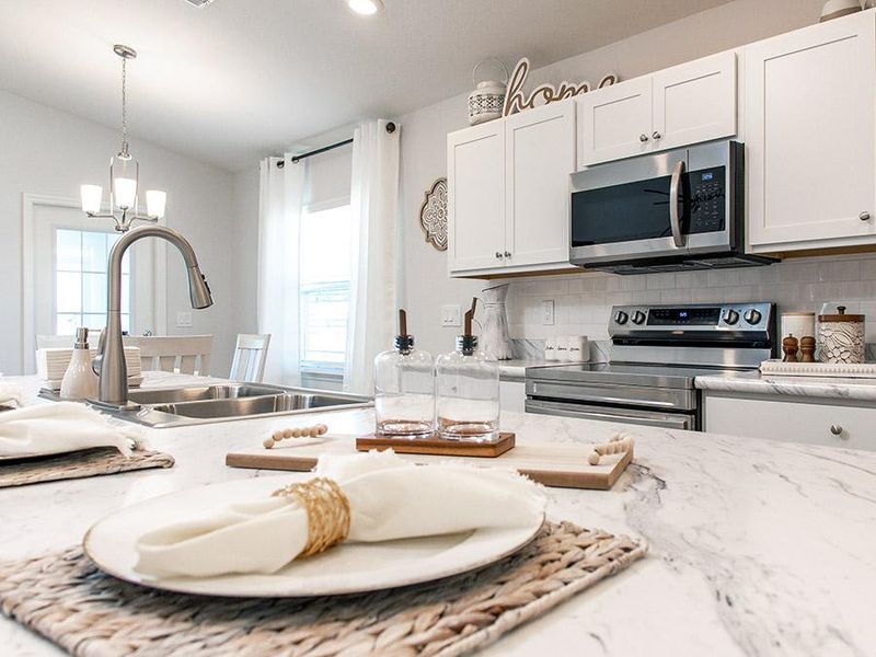 Homes at Gracelyn Grove include an open kitchen, designed for your life - Peyton home plan