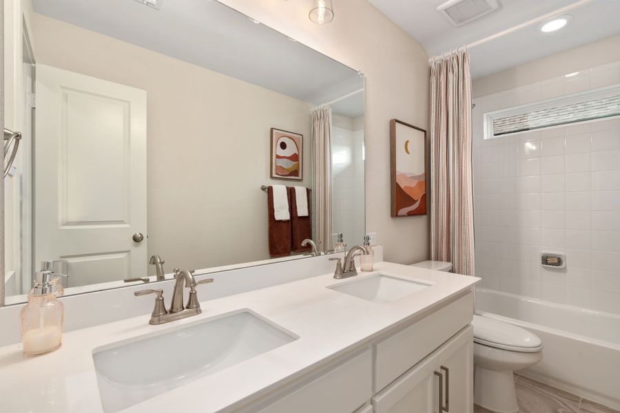 Plan 1146 Secondary Bathroom - Mosaic 50s Model - Photo by American Legend Homes