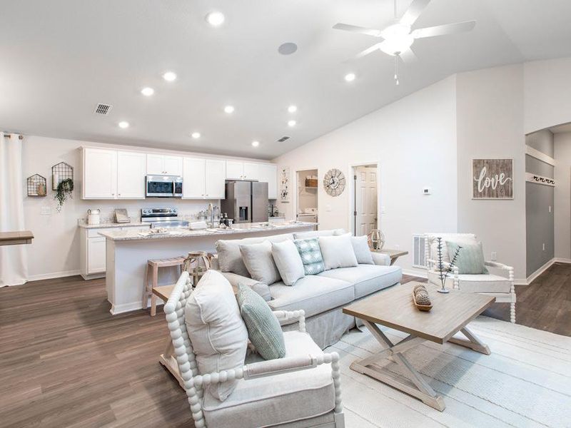 In your new home, enjoy a warm and welcoming living area, ideal for gathering with friends and family - Parker model home in Eagle Lake, FL