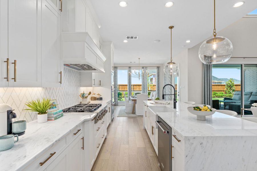 Plan 1640 Kitchen - Mosaic 60s Model - Photo by American Legend Homes