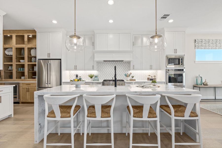 Plan 1640 Kitchen - Mosaic 60s Model - Photo by American Legend Homes