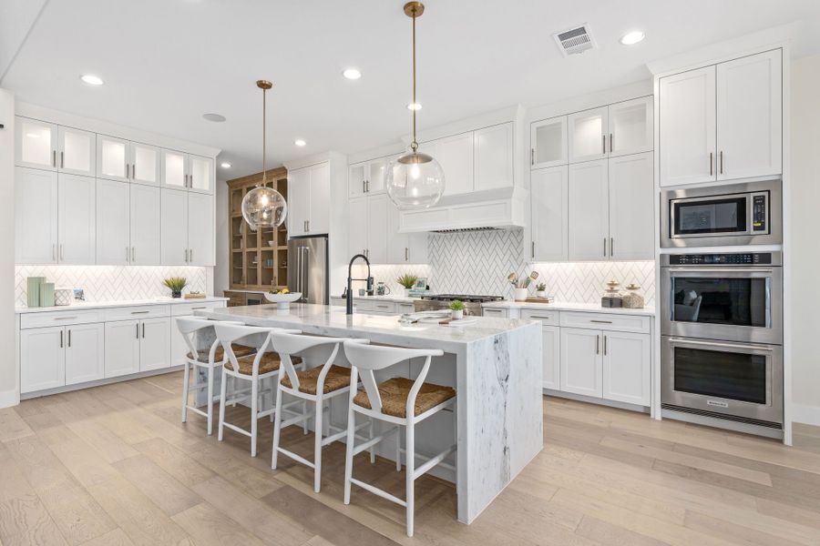 Plan 1640 Kitchen - Mosaic 60s Model - Photo by American Legend Homes