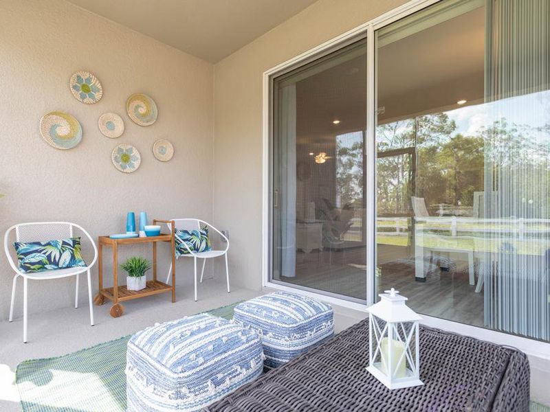 Your living space extends outdoors to your covered lanai - Shelby model home in Lake Alfred, FL