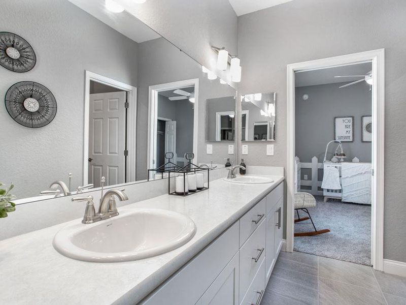 Convenient features, such as this Jack-and-Jill bath, simplify daily life - Waylyn home plan