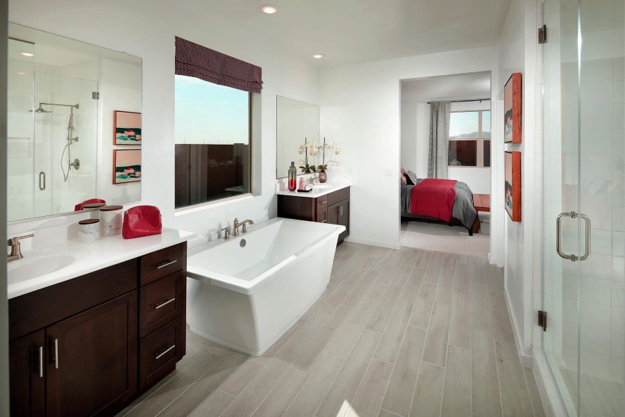 The primary bath and walk-in closet offer plenty of space to get ready.