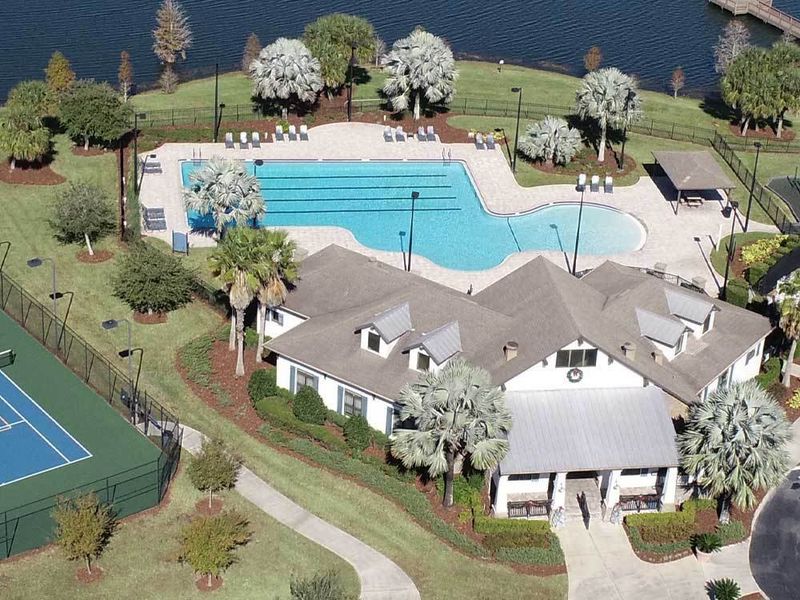 Community clubhouse with resort style and lap pool at BridgeWater in Lakeland Florida new home construction by William Ryan Homes Tampa