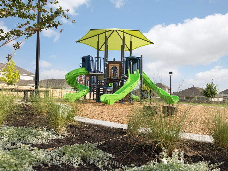 Kids can take a break from the pool and enjoy the playground next door.