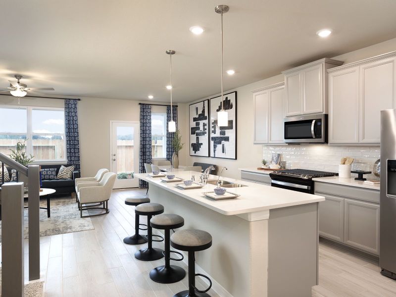Entertain guests in your open concept kitchen - modeled at Dunvale Village