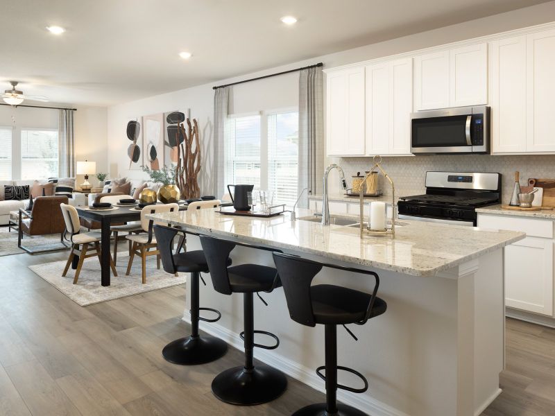 Bring together family and friends in the Winedale's kitchen, living, and dining areas.