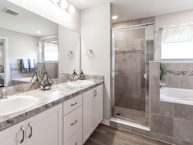And, enjoy the convenience and luxury of a private en-suite owner`s bath - Parker model home in Parrish, FL