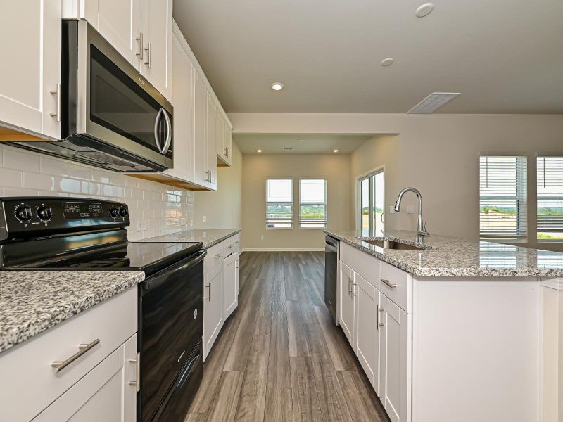 Kitchen in the Dallas Floorplan at Morgan Hills in Albemarle, NC.