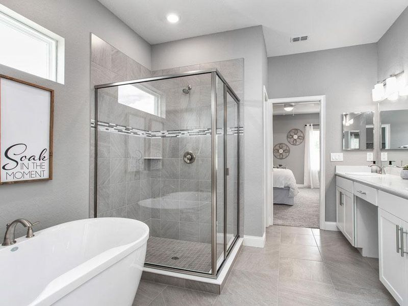 Enjoy an at-home spa experience in your en-suite owner`s bath - Waylyn home plan