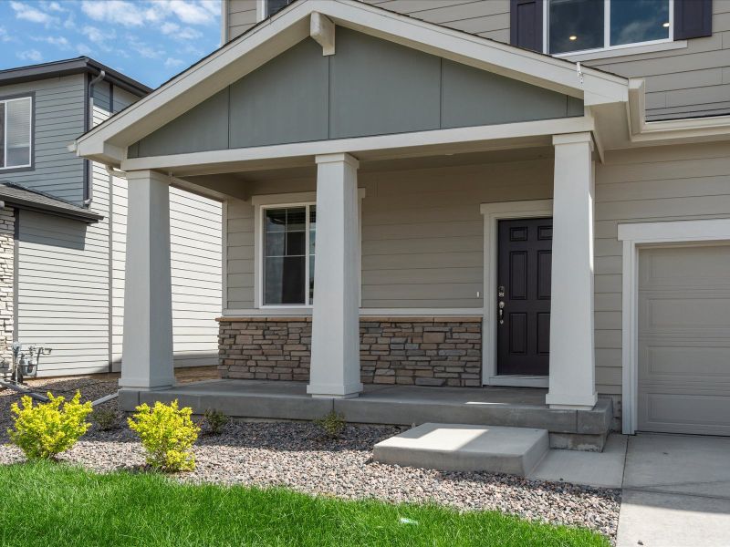 The Fraser floorplan exterior images taken at a Meritage Homes community in Northern Colorado.