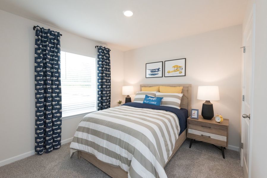 The Dallas floorplan features two secondary bedrooms.