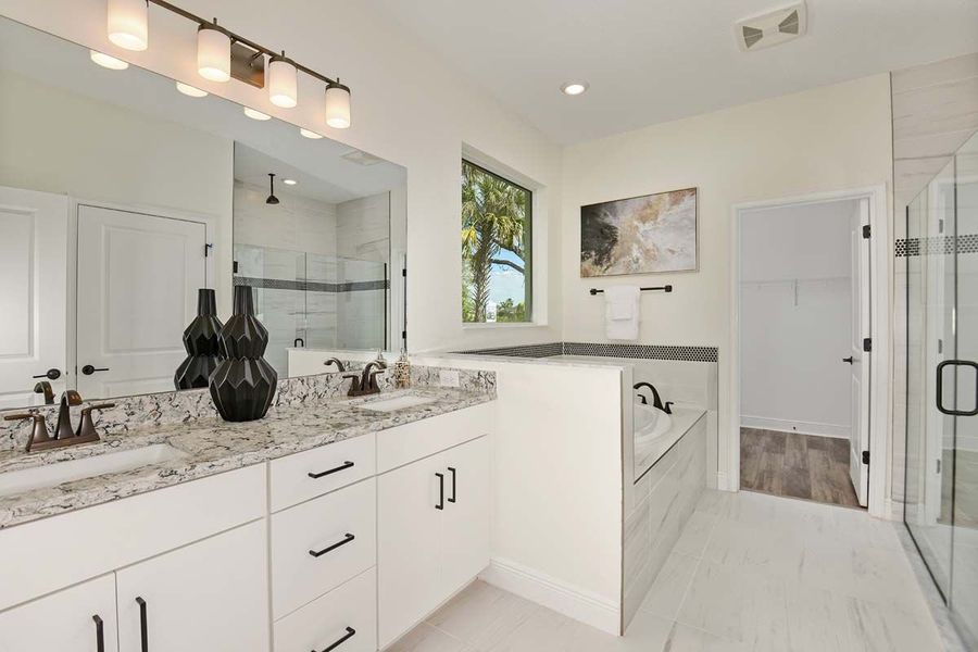 Sandalwood new construction home plan owner's bathroom at Tea Olive Terrace at the Fairways by William Ryan Homes Tampa
