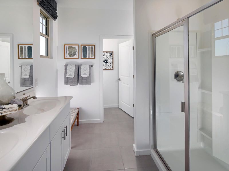 Take advantage of the spa-like features of the primary bathroom.