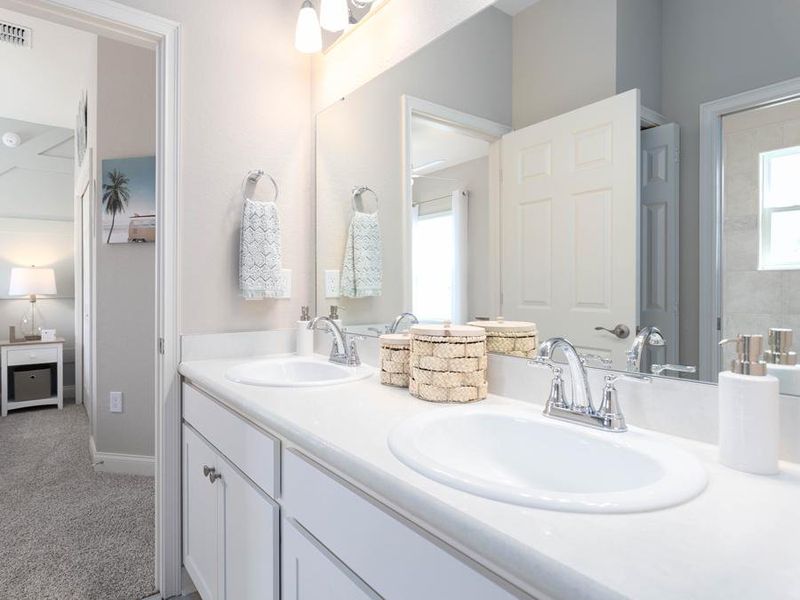 These new homes in Lake Alfred include convenient features such as this Jack-and-Jill bath - Shelby model home in Lake Alfred, FL
