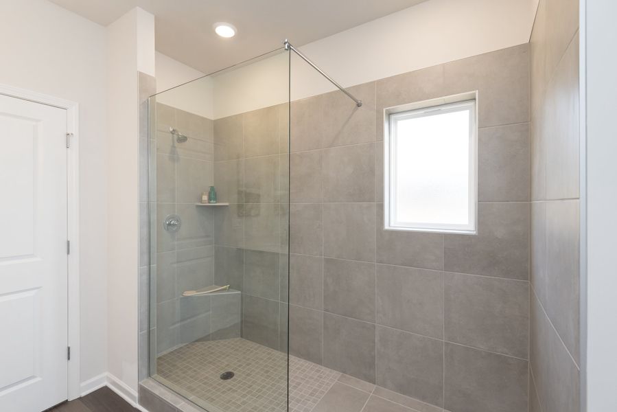 The gorgeous walk-in shower gives you ample space as needed.