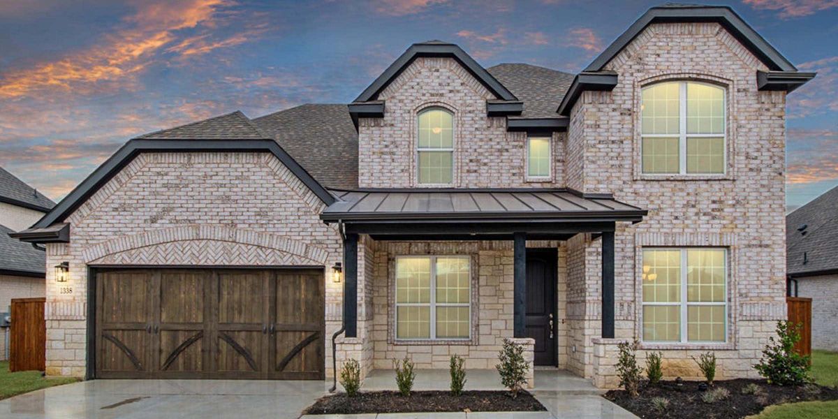 Elevation E with Stone | Concept 3218 at Abe's Landing in Granbury, TX by Landsea Homes