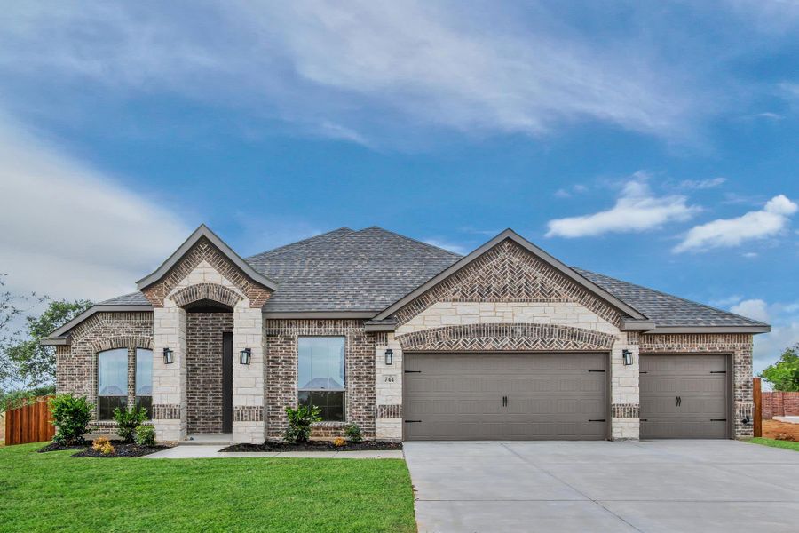 Elevation A with Stone | Concept 2671 at Mockingbird Hills in Joshua, TX by Landsea Homes