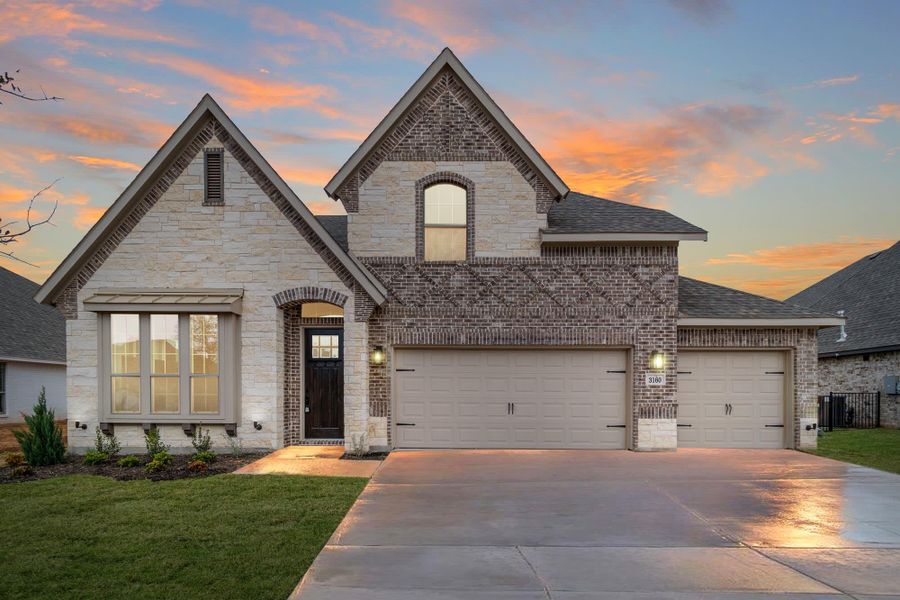 Elevation C with Stone | Concept 3015 at Abe's Landing in Granbury, TX by Landsea Homes