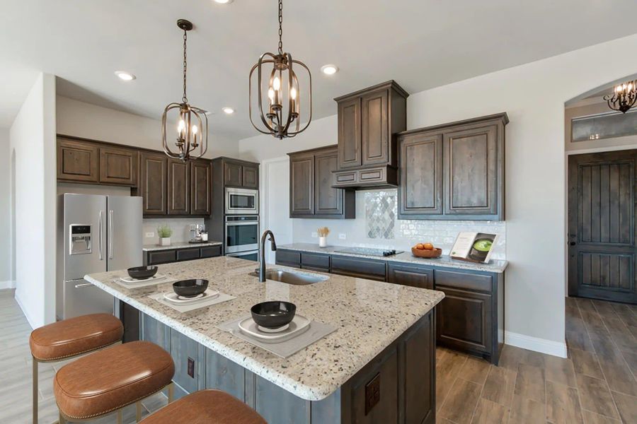 Kitchen | Concept 2586 at Hidden Creek Estates in Van Alstyne, TX by Landsea Homes