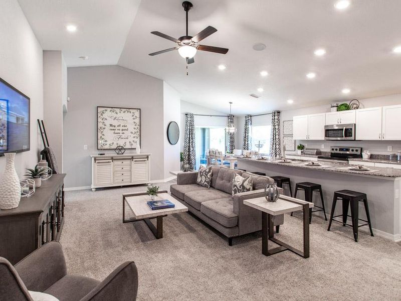 Enjoy a welcoming open living area, perfect for gathering with family and friends - Parker model home in Parrish, FL