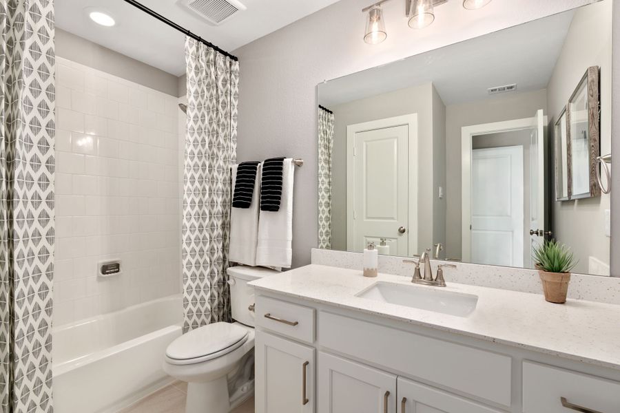 Plan 1146 Secondary Bathroom - Mosaic 50s Model - Photo by American Legend Homes