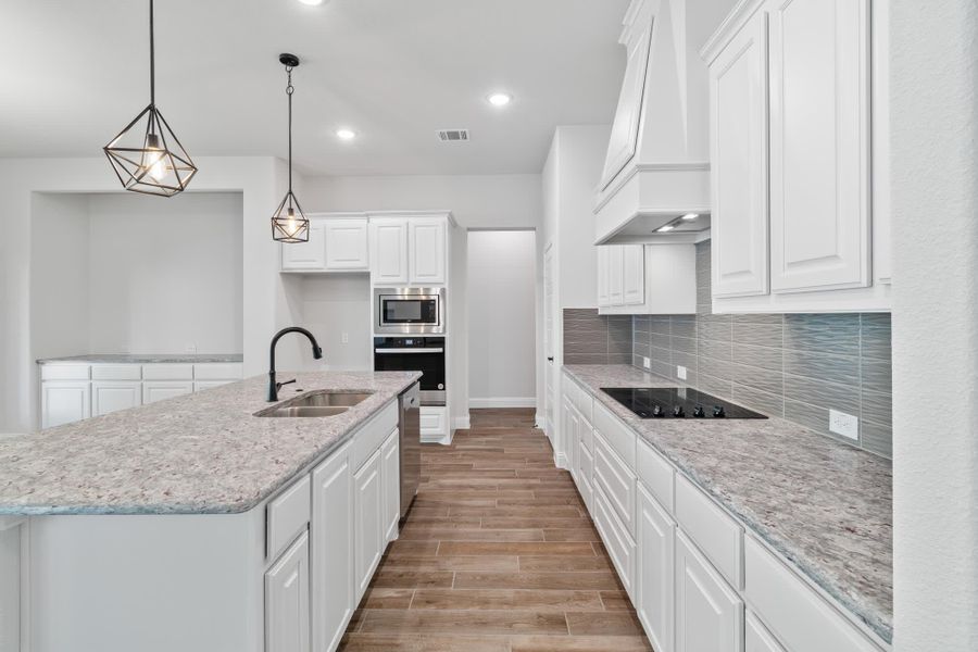 Kitchen | Concept 2050 at Abe's Landing in Granbury, TX by Landsea Homes
