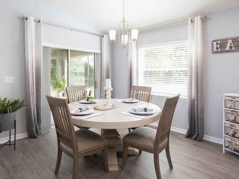 Meals are a delight in your sunny dining cafe - Raychel model home in Palmetto, FL