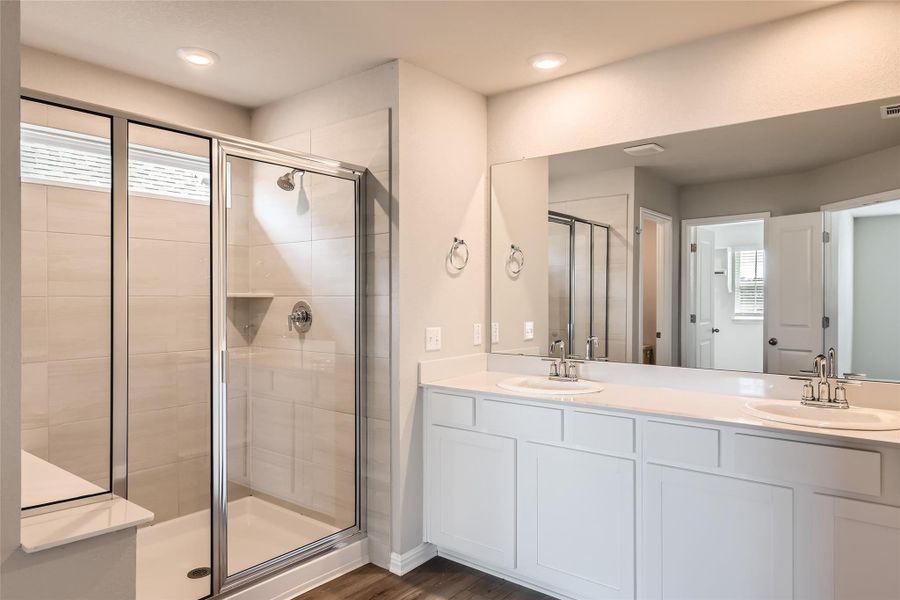 Double doors open into your own private ensuite bathroom with a private toilet and a walk-in closet.