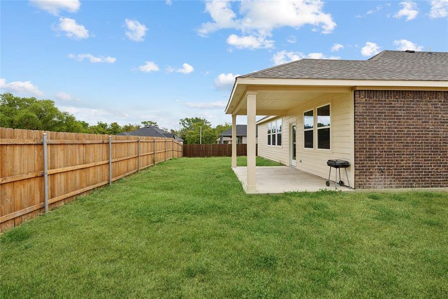 View of yard featuring a patio