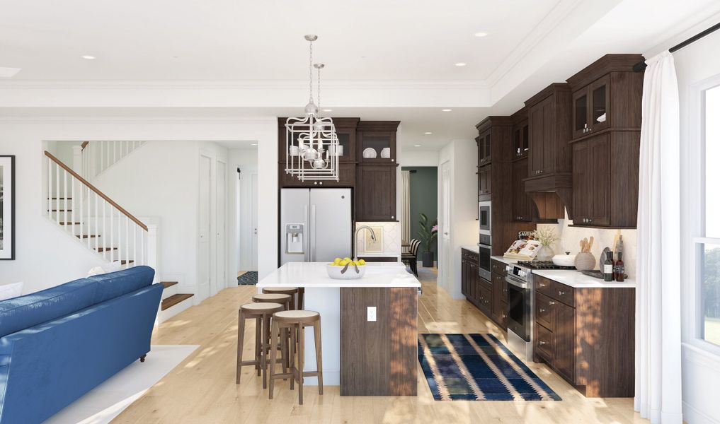 Kitchen with pendant lighting and light quartz countertops