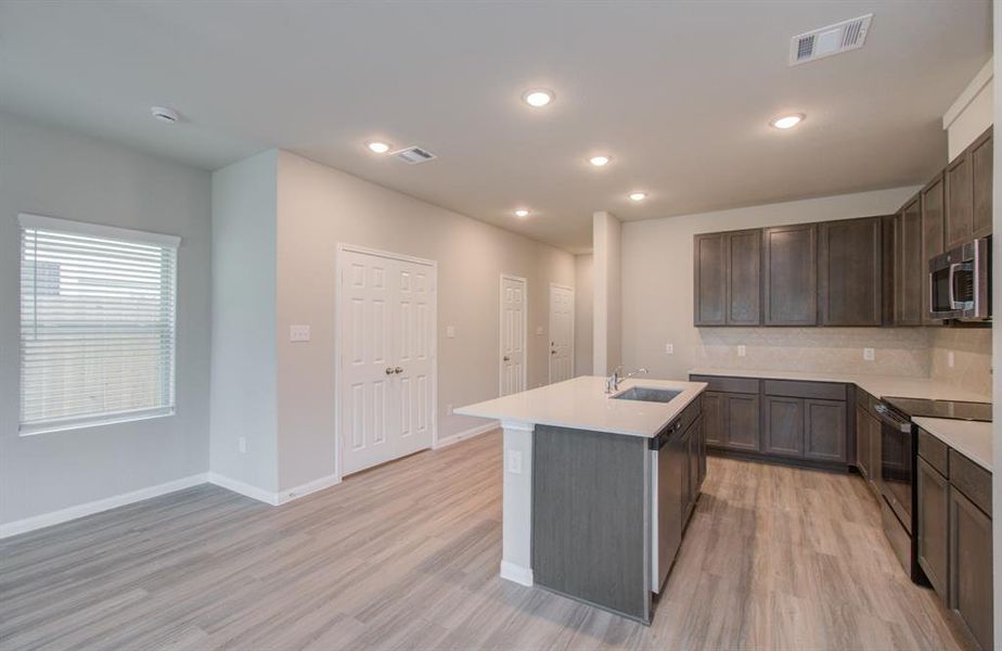 Island kitchen with counter seating