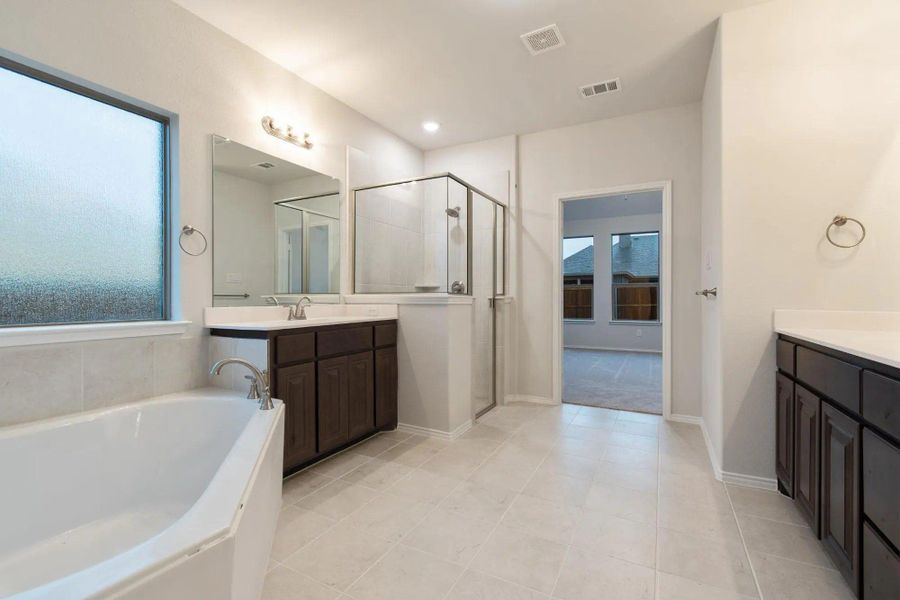 Primary Bathroom | Concept 2844 at Hunters Ridge in Crowley, TX by Landsea Homes